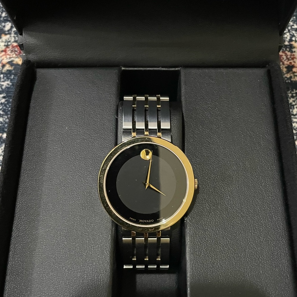 MOVADO ESPERANZA WITH 39MM BLACK DIAL ANDTWO-TONE STAINLESS STEEL BRACELET.
